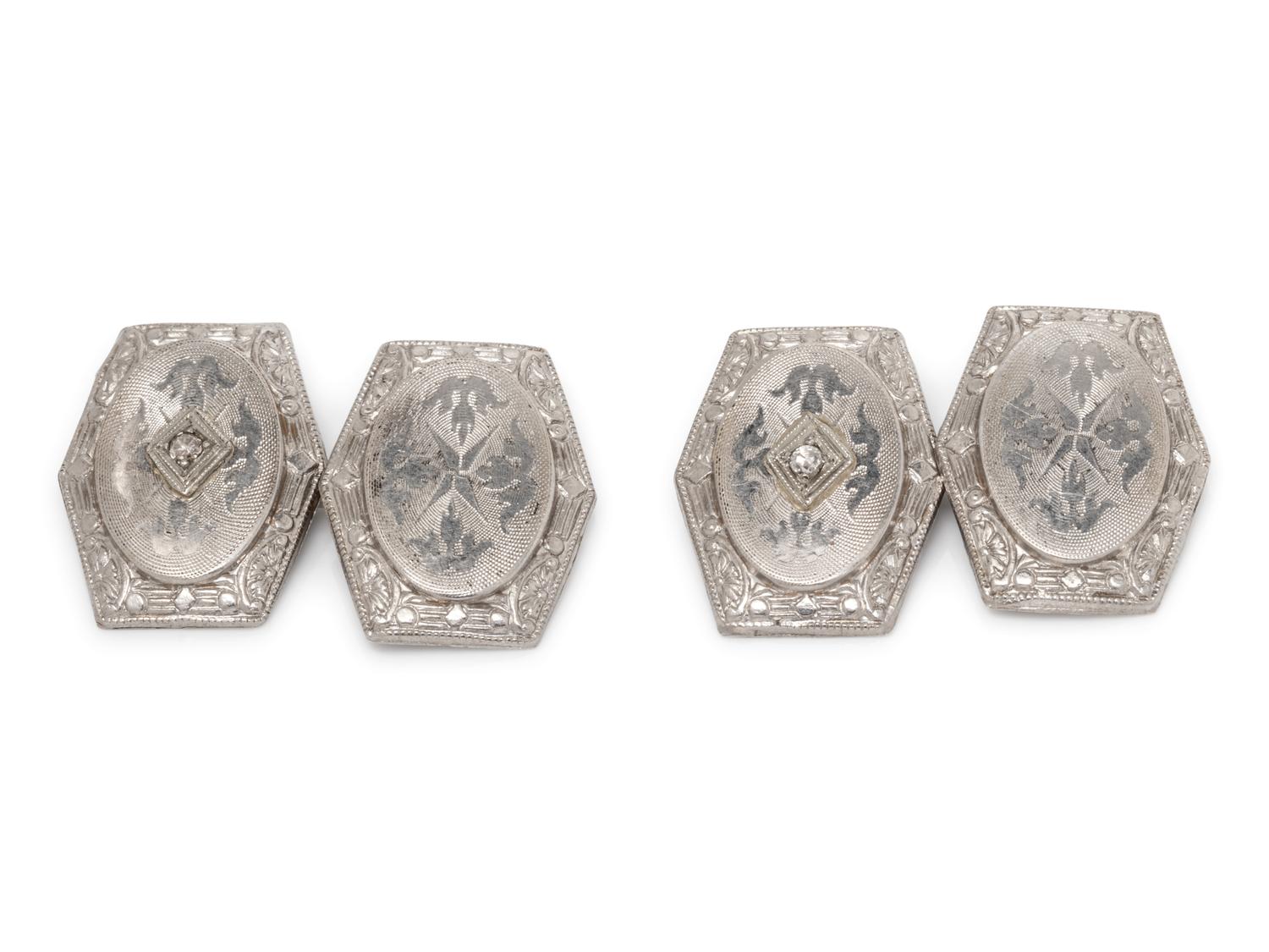A Pair of Platinum Topped 14 Karat Yellow Gold and Diamond Cufflinks,