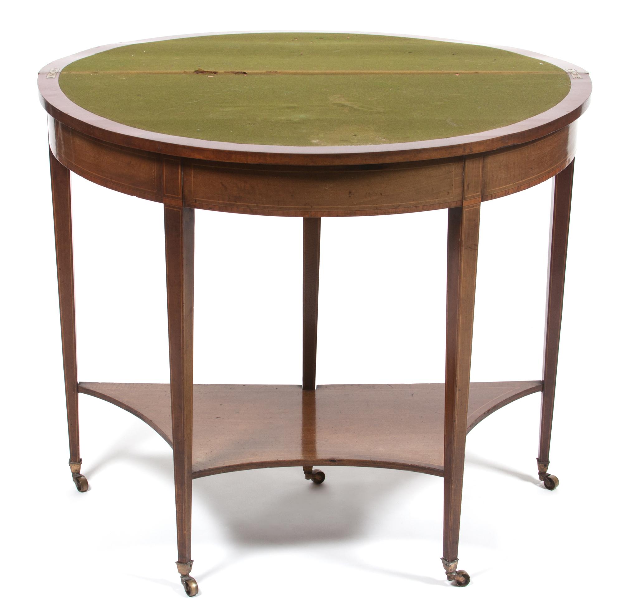 A Georgian Style Inlaid Flip-Top Game Table Height 30 1/2 x width 35 x depth 18 inches (closed). — 19TH/20TH CENTUTY