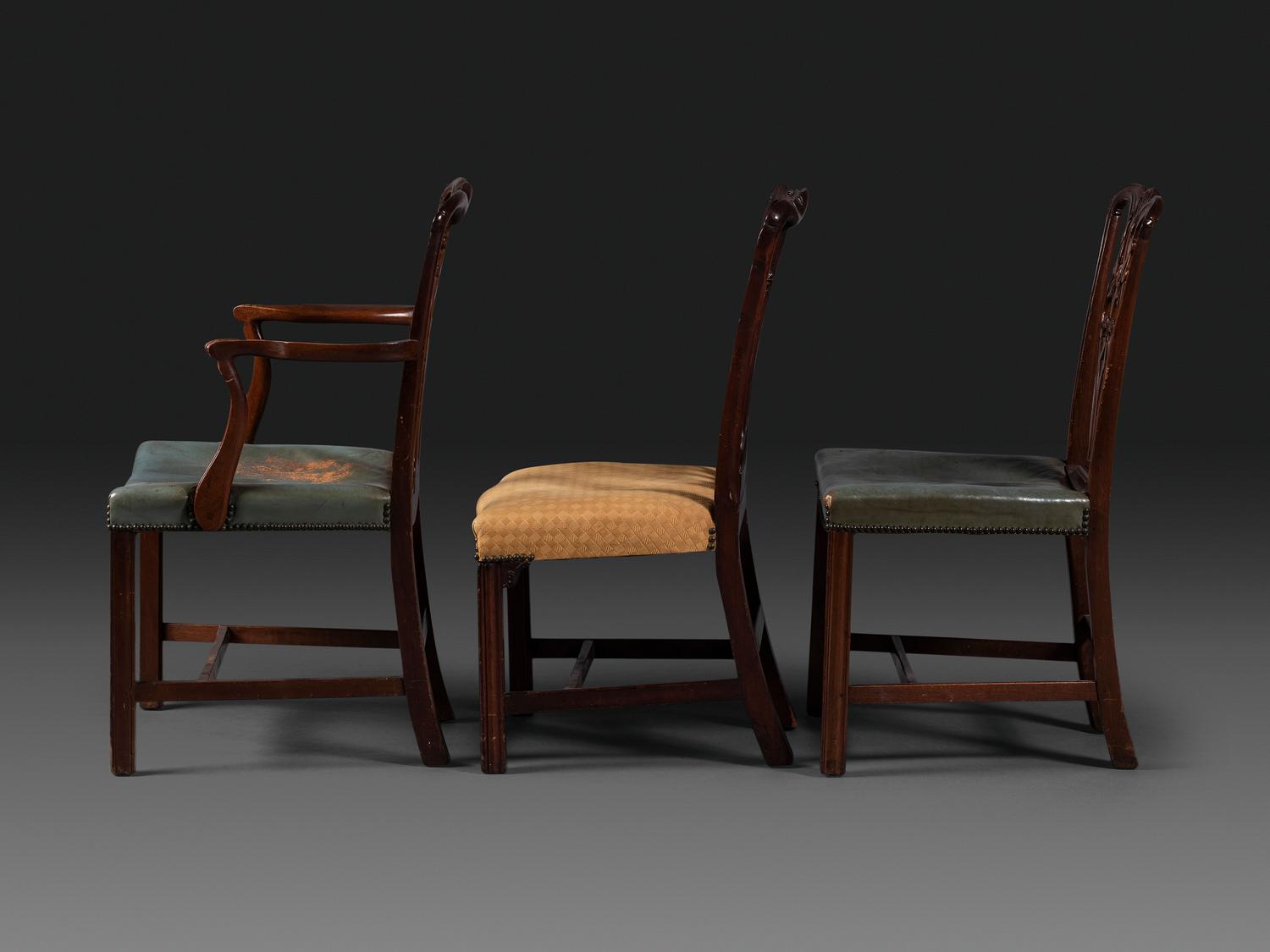 A Set of Six Chippendale Style Carved Mahogany Dining Chairs