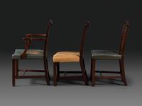 A Set of Six Chippendale Style Carved Mahogany Dining Chairs