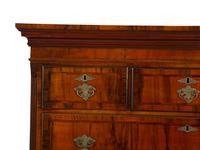 A Queen Anne Figured Mahogany Chest on Stand