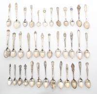 A Collection of American Souvenir Spoons, 20TH CENTURY, comprising silver and silver-plate spoons; including Chicago and Midwest state