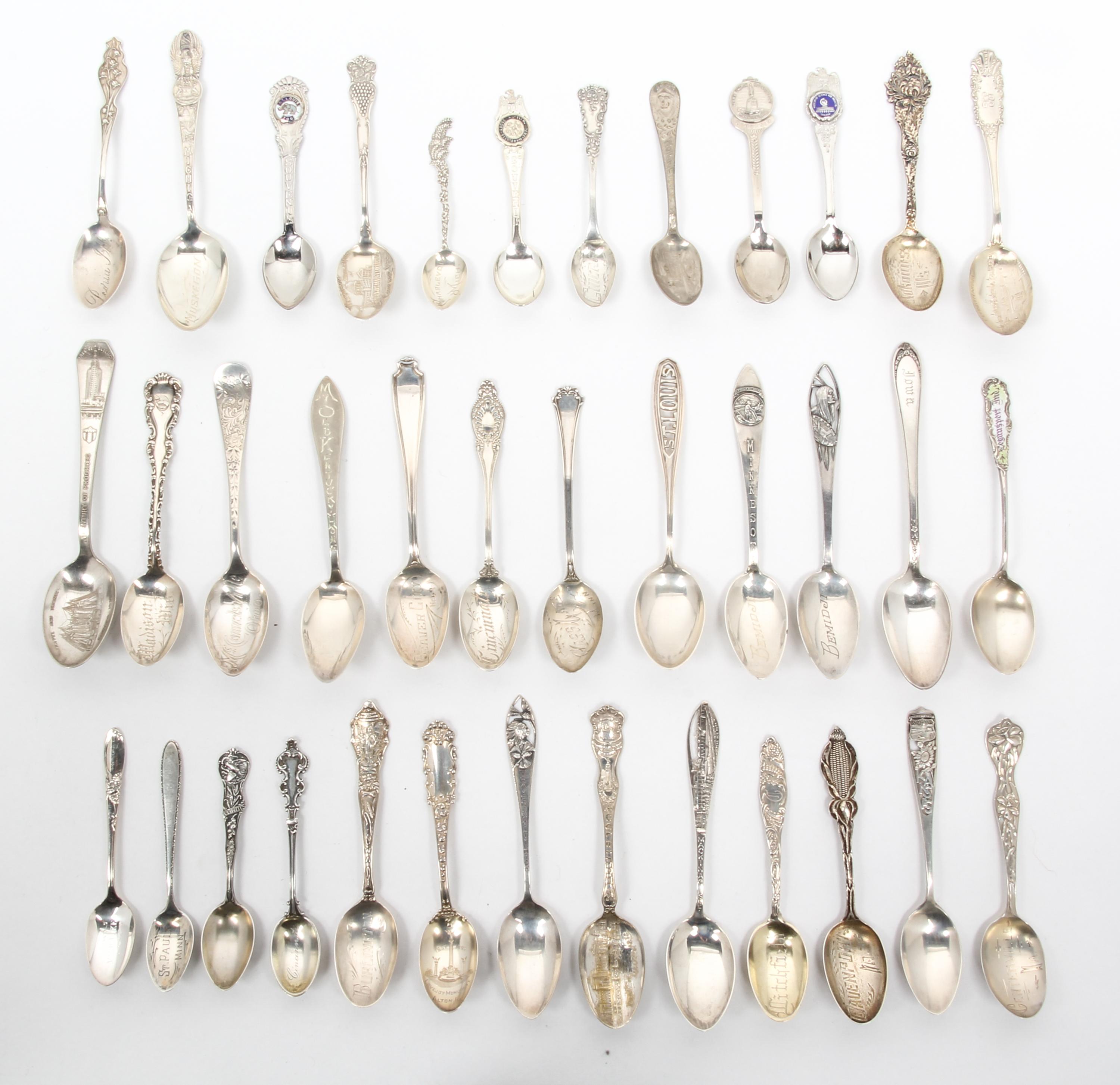 A Collection of American Souvenir Spoons, 20TH CENTURY, comprising silver and silver-plate spoons; including Chicago and Midwest state