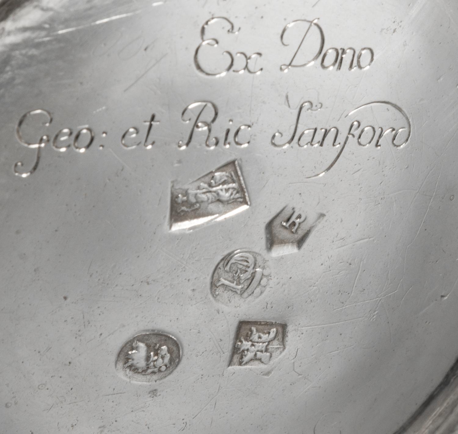 A George I Britannia Silver Pitcher, John Elston, Exeter, 1717, of baluster form with worked with a band to the body of the pitcher and