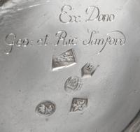 A George I Britannia Silver Pitcher, John Elston, Exeter, 1717, of baluster form with worked with a band to the body of the pitcher and