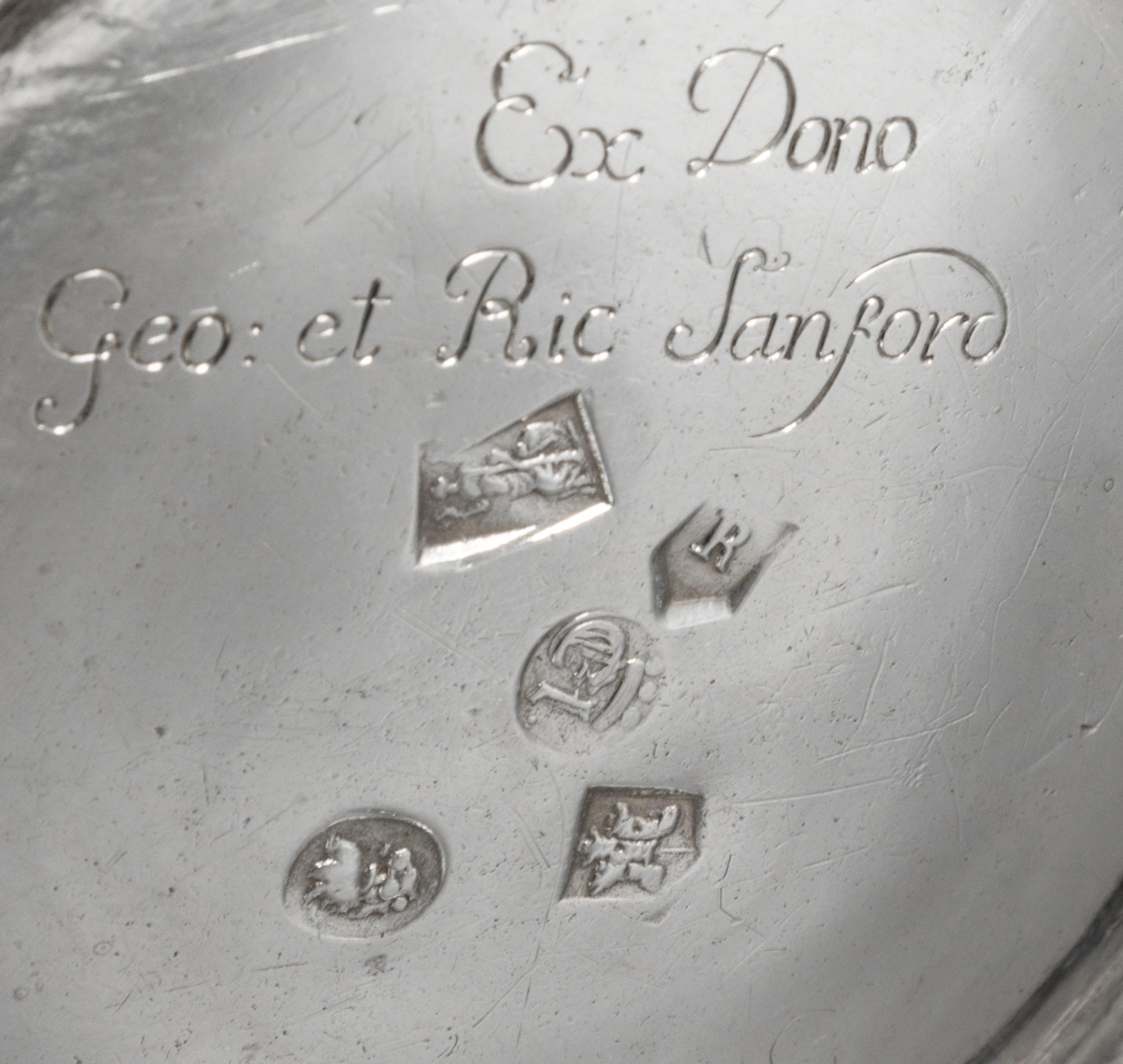 A George I Britannia Silver Pitcher, John Elston, Exeter, 1717, of baluster form with worked with a band to the body of the pitcher and