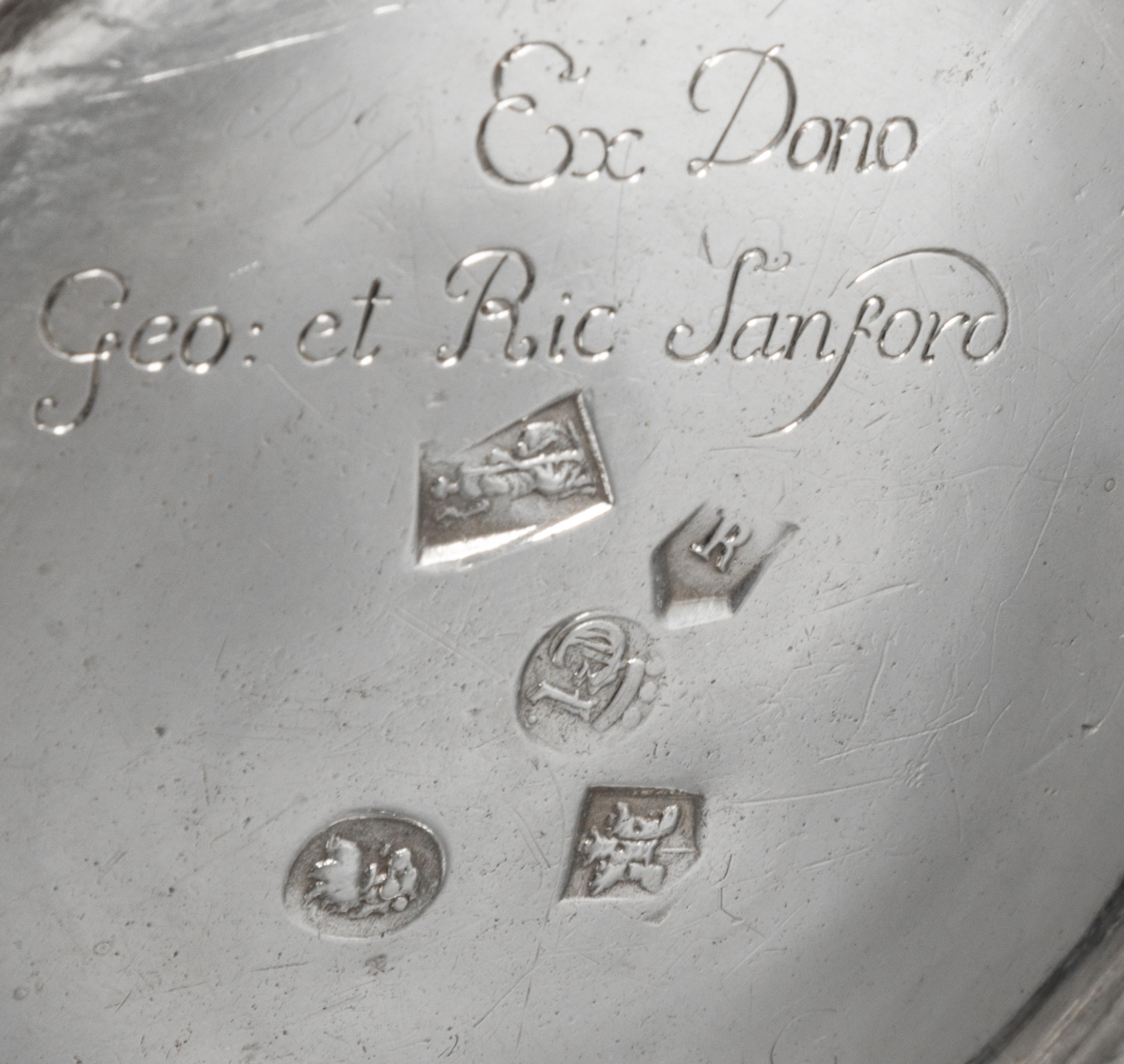 A George I Britannia Silver Pitcher, John Elston, Exeter, 1717, of baluster form with worked with a band to the body of the pitcher and