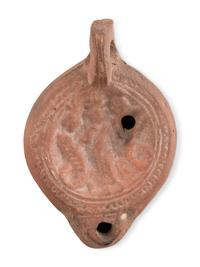 A Group of Seventeen Roman Oil Lamps and Lamp Handles
