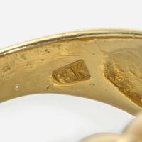 An 18K Yellow Gold and Pavé Diamond Ring