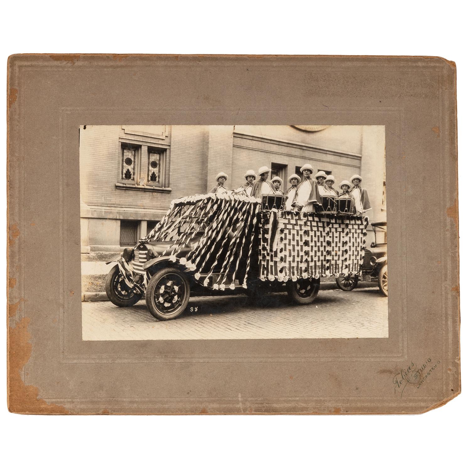 [WOMEN'S RIGHTS]. Photograph of Suffrage parade float with flier concerning the parade.