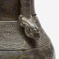A Chinese archaistic patinated bronze covered wine vessel, you 倣古风格卣 late Ming/Qing dynasty ?????