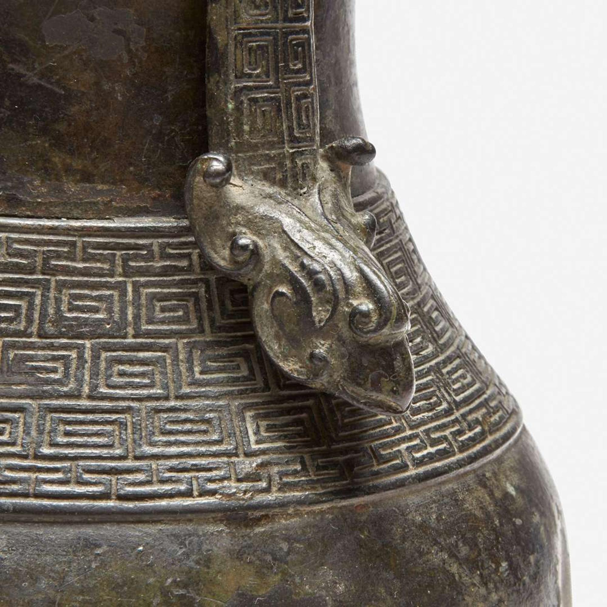 A Chinese archaistic patinated bronze covered wine vessel, you 倣古风格卣 late Ming/Qing dynasty ?????