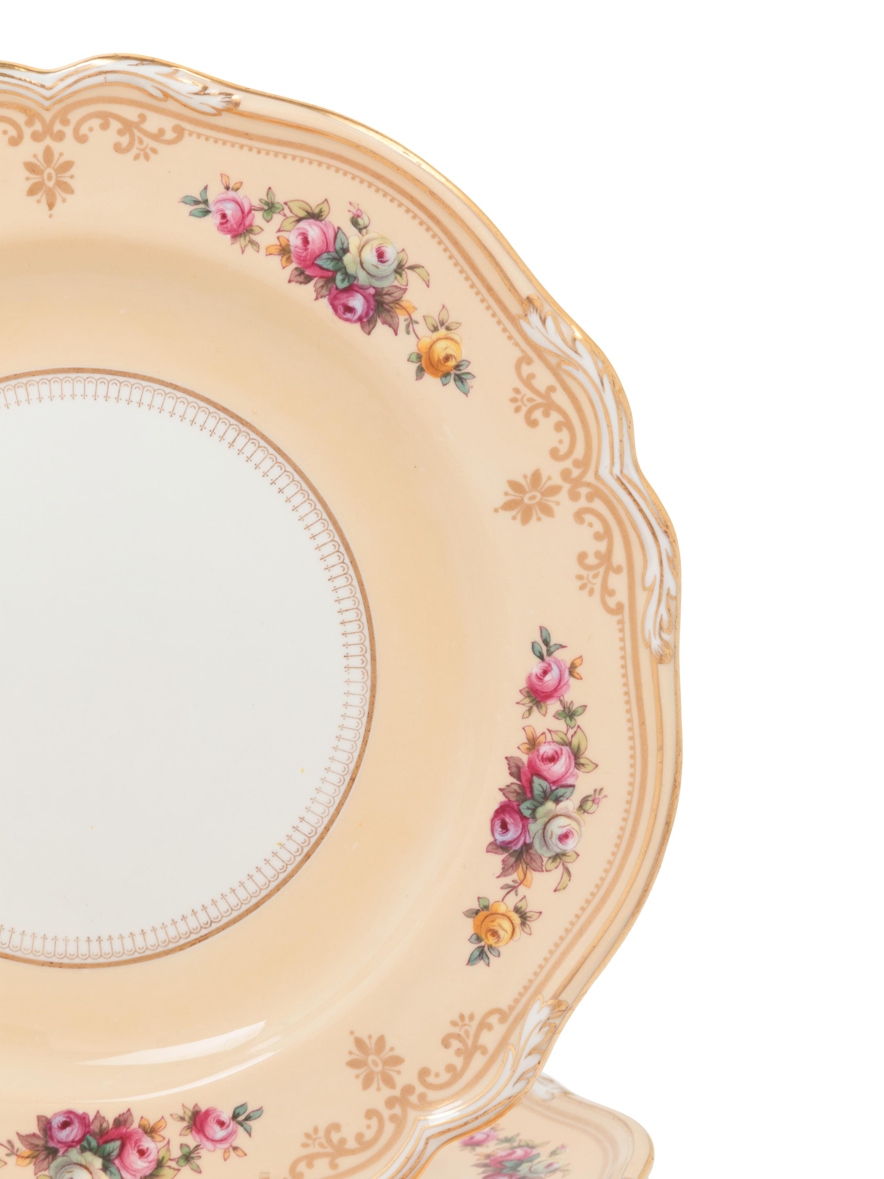 A Spode Parcel Gilt Porcelain Dinner Service