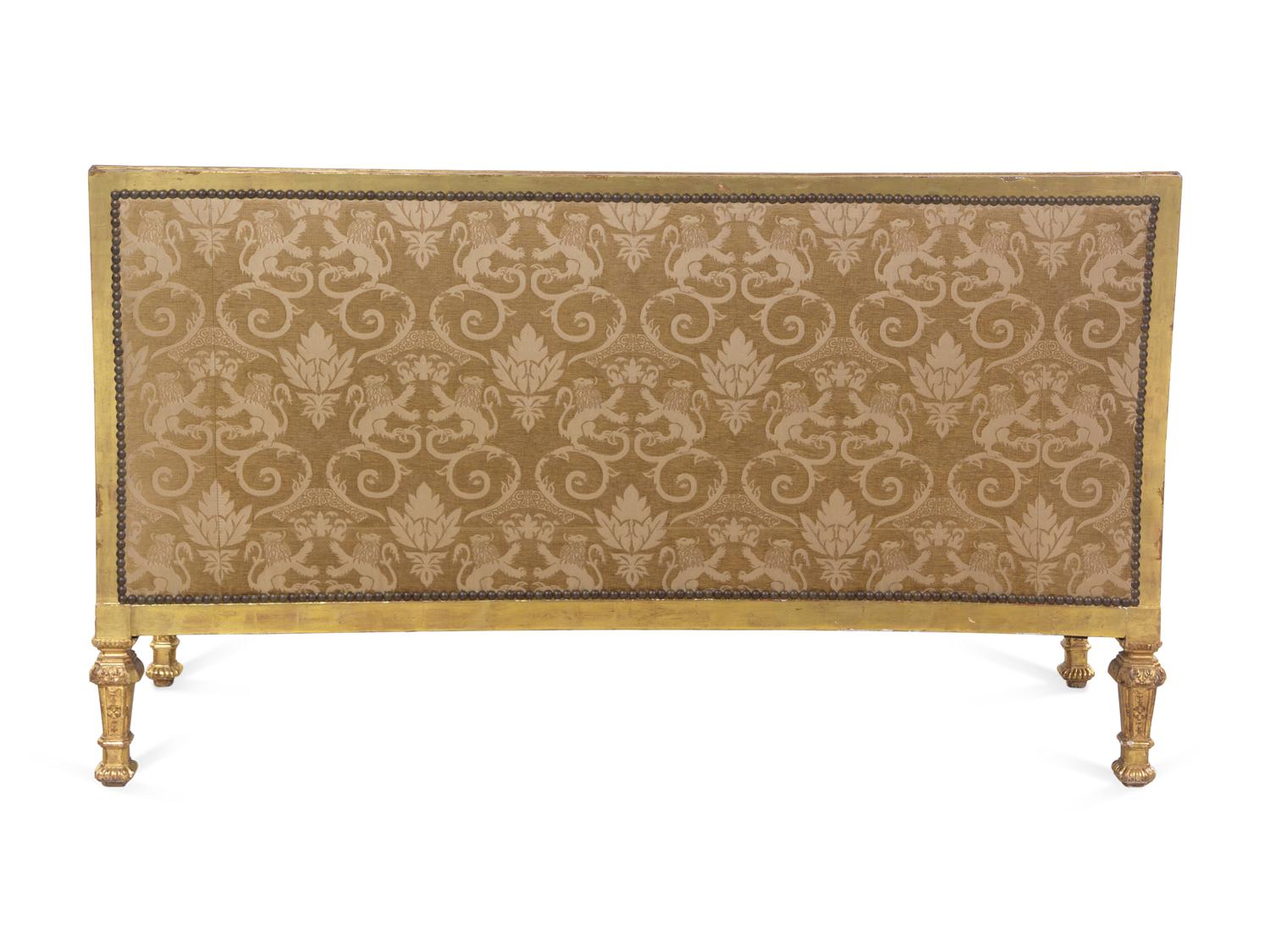 A Pair of Régence Style Carved Giltwood Sofas