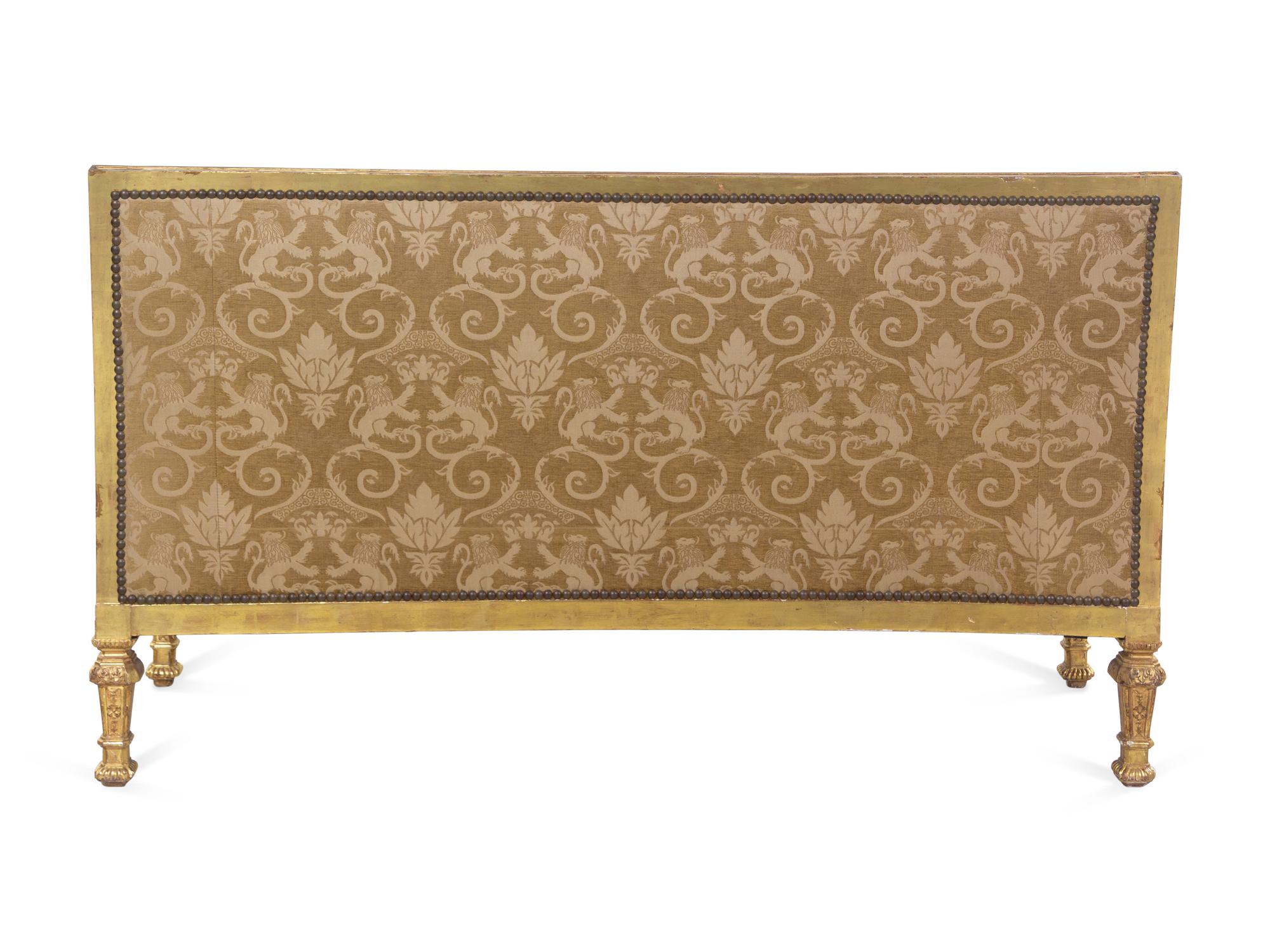 A Pair of Régence Style Carved Giltwood Sofas