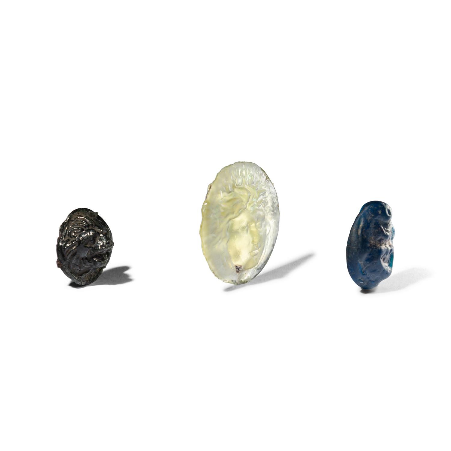 Three Roman Glass Relief Medallions