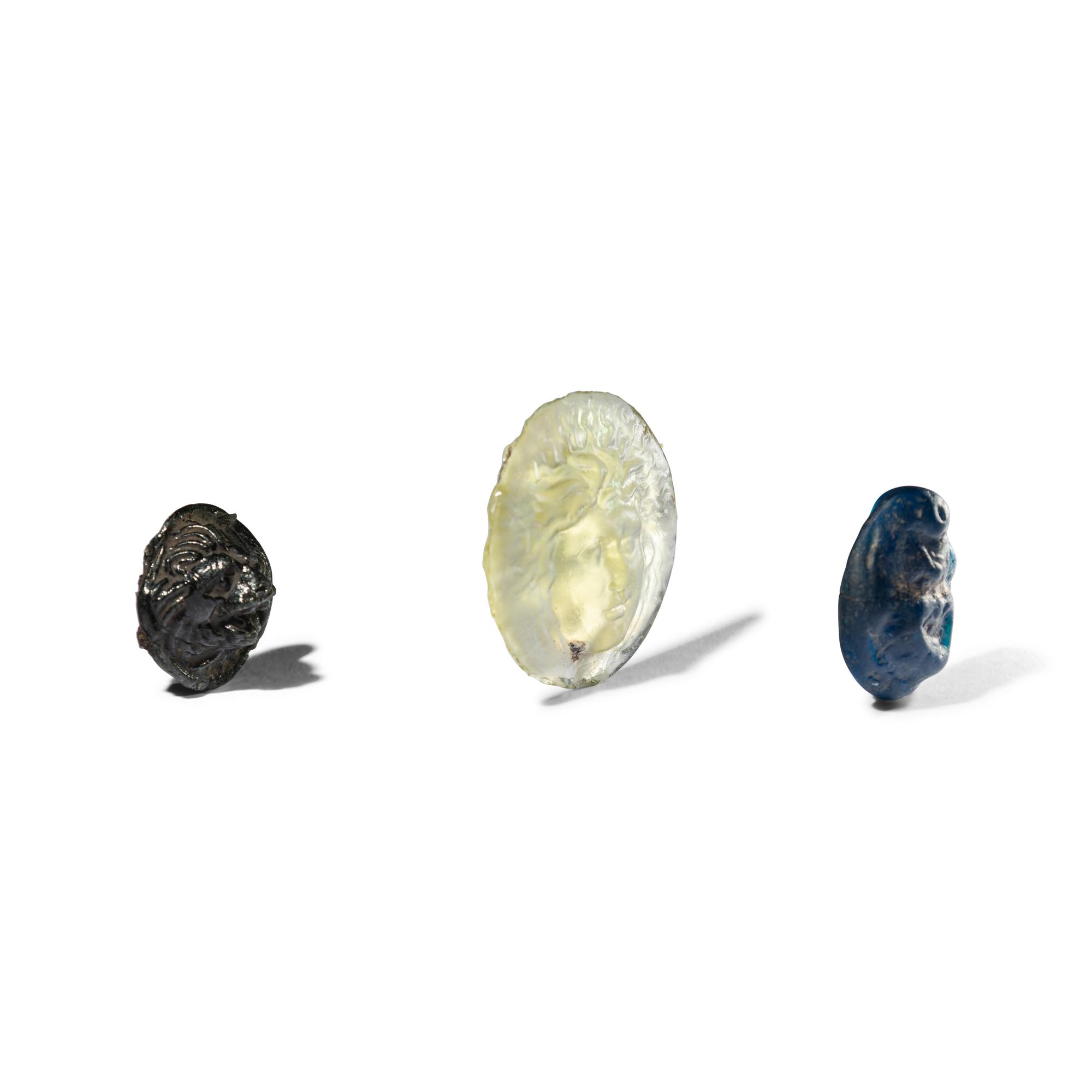 Three Roman Glass Relief Medallions