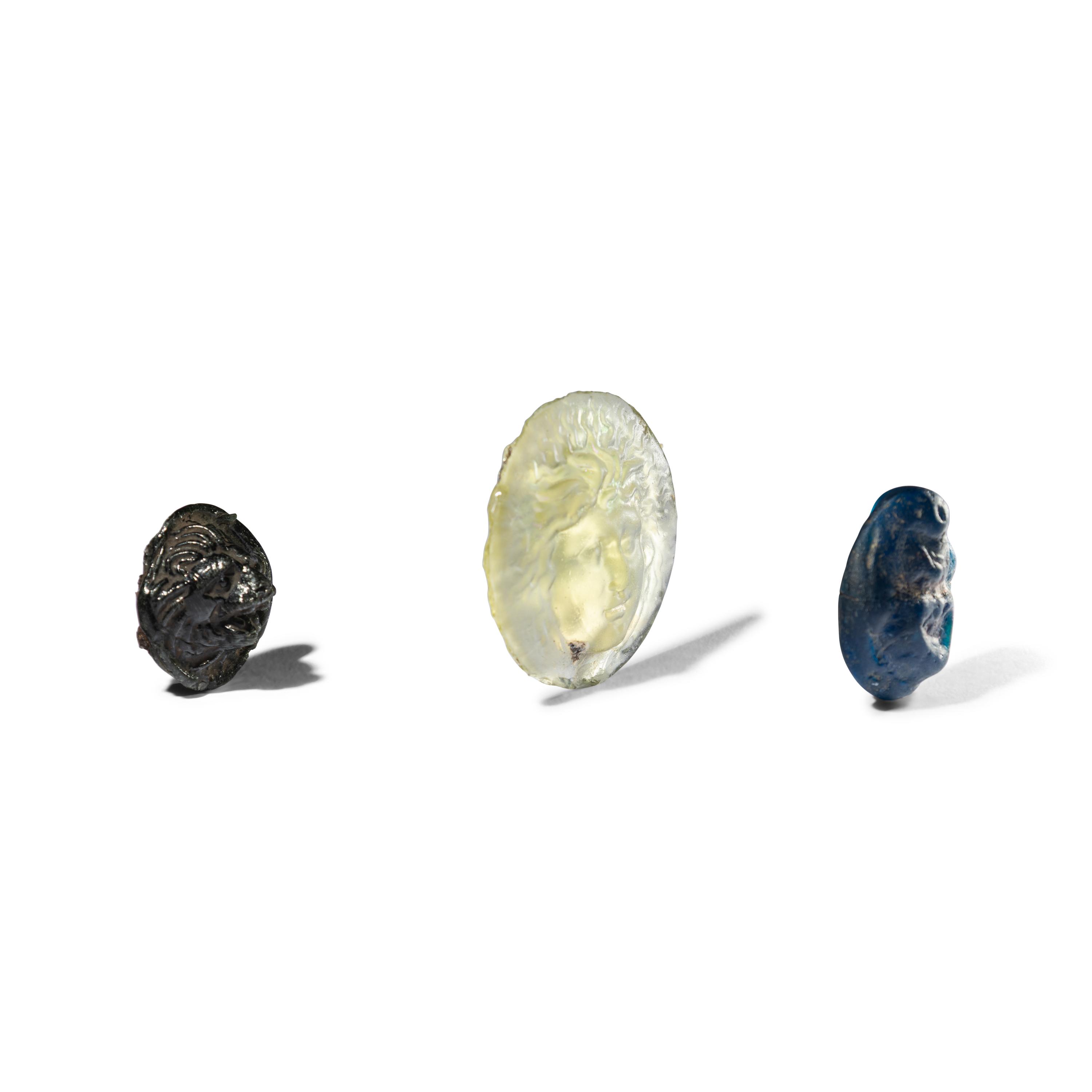Three Roman Glass Relief Medallions