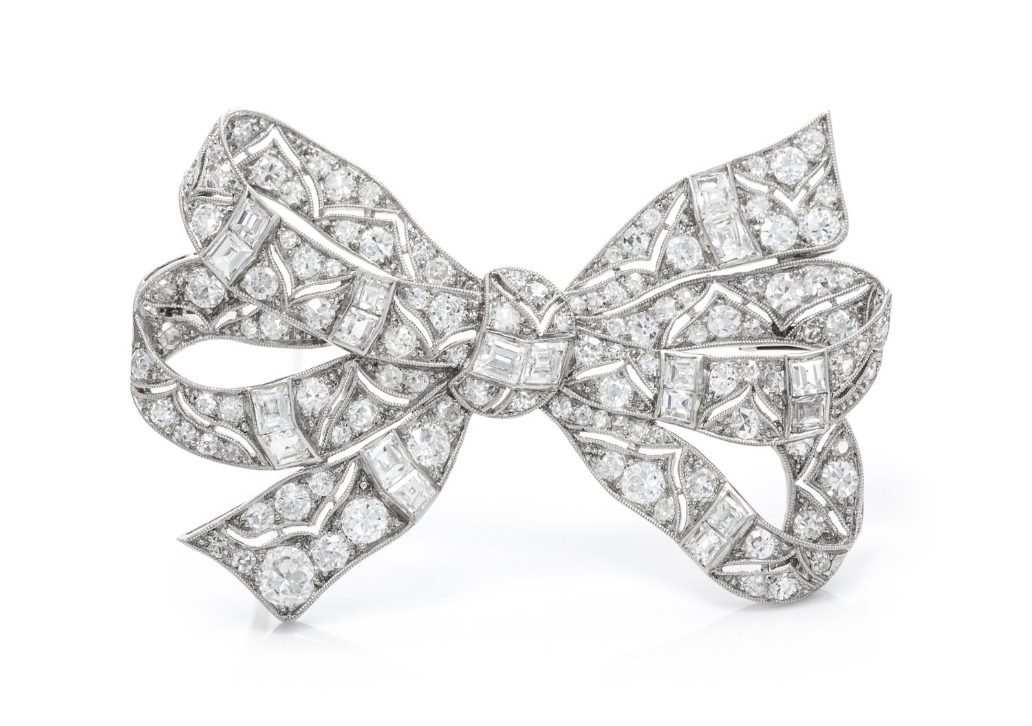 A Platinum and Diamond Bow Brooch, Austrian, 9.00 dwts.