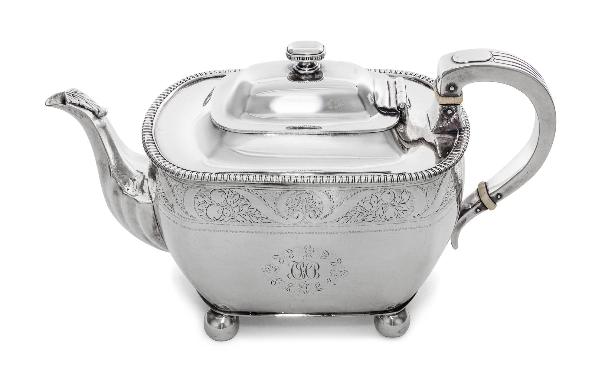 An American Silver Teapot, Frank W. Smith Silver Co., Gardner, MA, retailed by Rand & Crane, Boston, MA, of squat form with a gadrooned