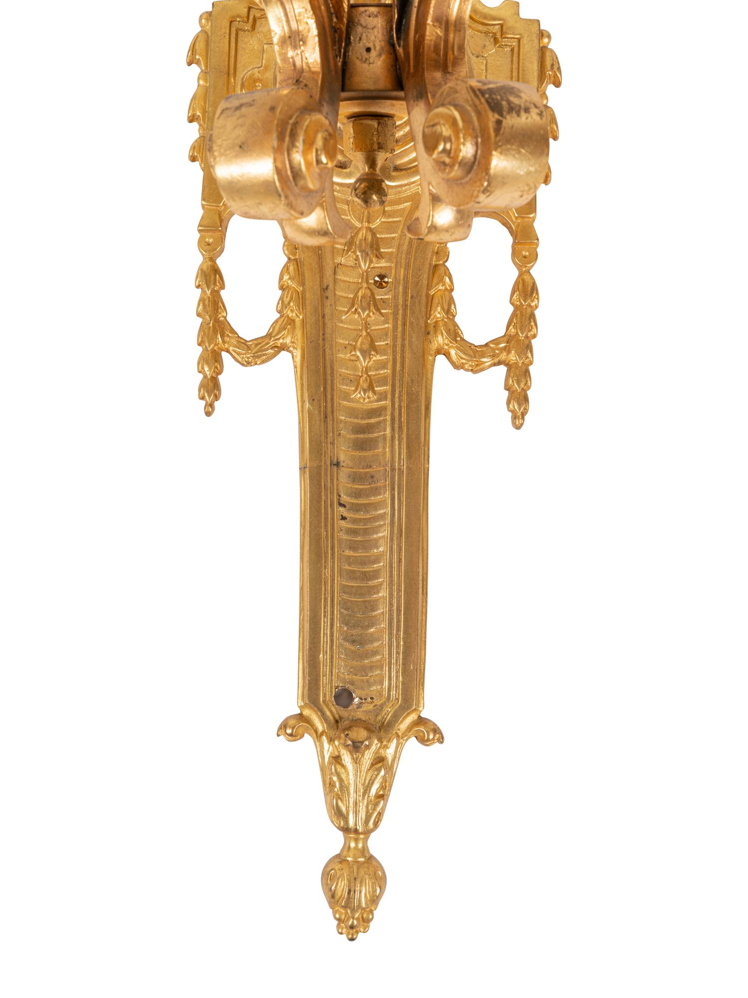 A Pair of Louis XVI Style Gilt Bronze Two-Light Sconces