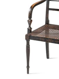 A Classical Black and Gilt Decorated Cane-Upholstered Armchair