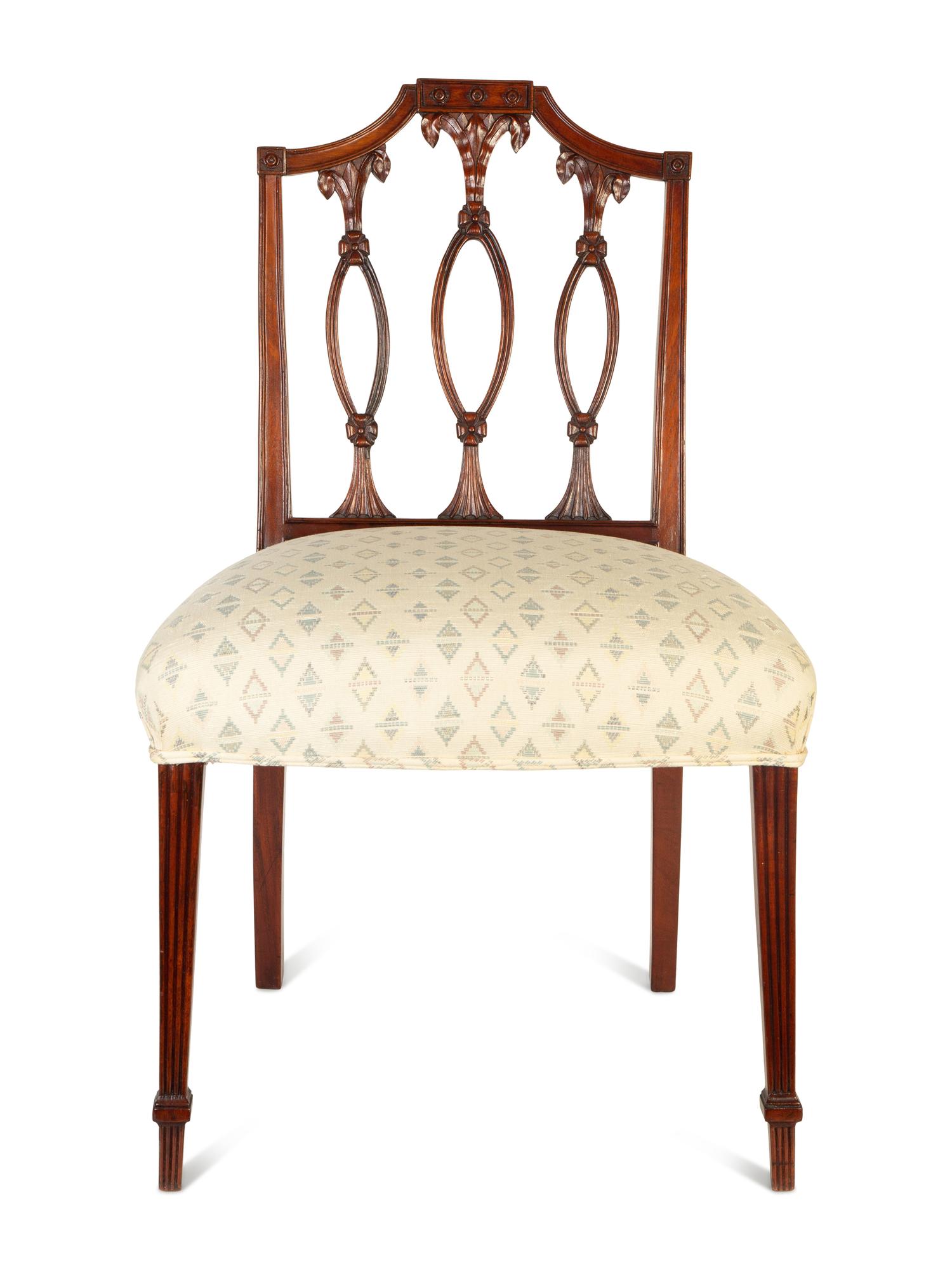 A Pair of Federal Carved Mahogany Side Chairs