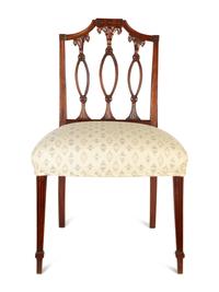 A Pair of Federal Carved Mahogany Side Chairs