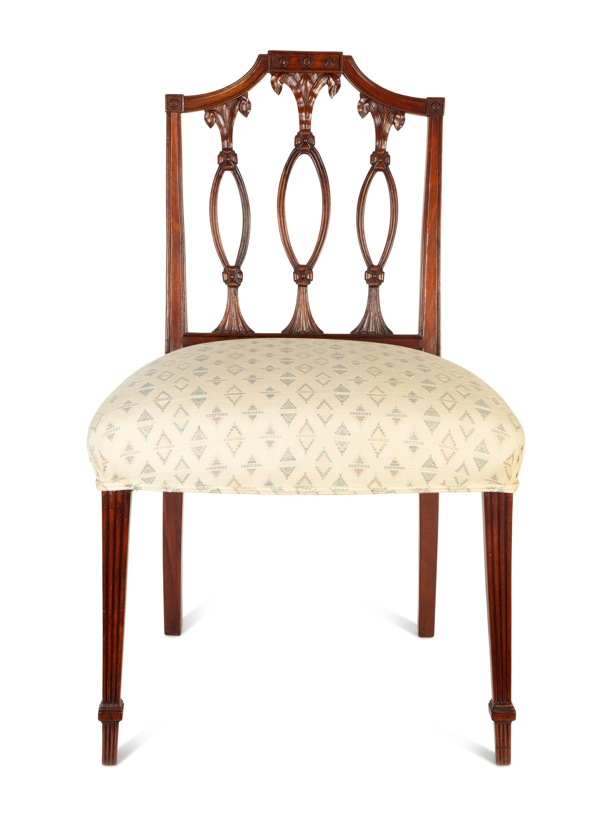 A Pair of Federal Carved Mahogany Side Chairs
