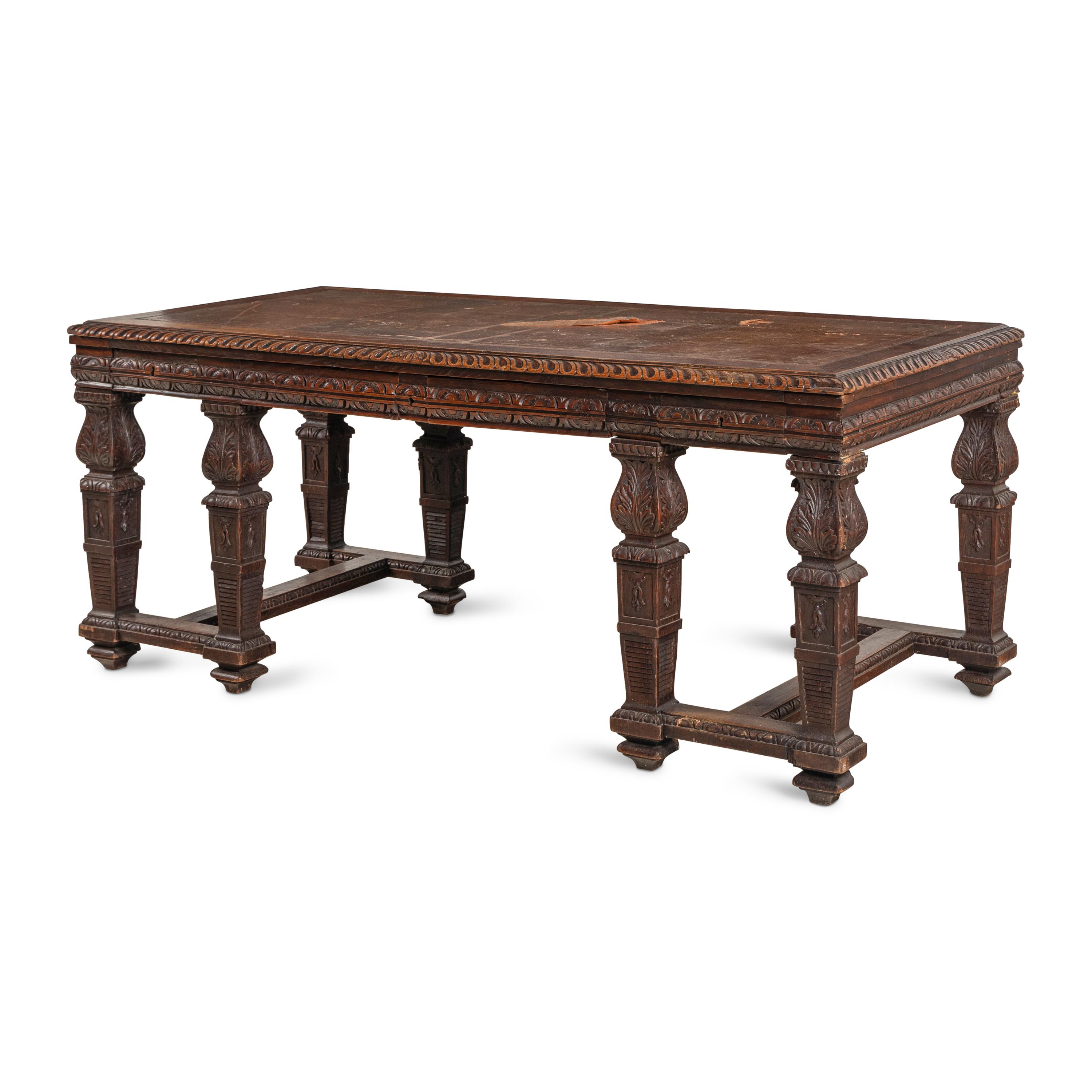 An Italian Carved Oak Writing Table