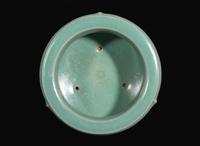 A celadon-glazed tripod censer 青瓷三足香爐