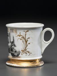 A Porcelain Shaving Mug Depicting a Steam Roller
