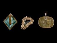Three Jade and Jadeite Inset Gilt Metal Mounted Jewelry