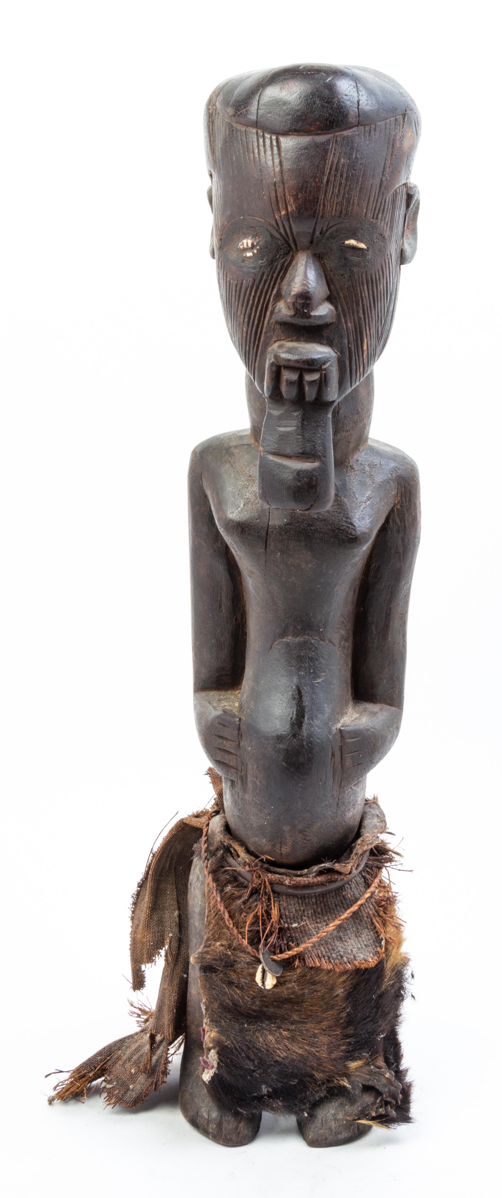 An African Wood Figure Height 25 1/4 inches.