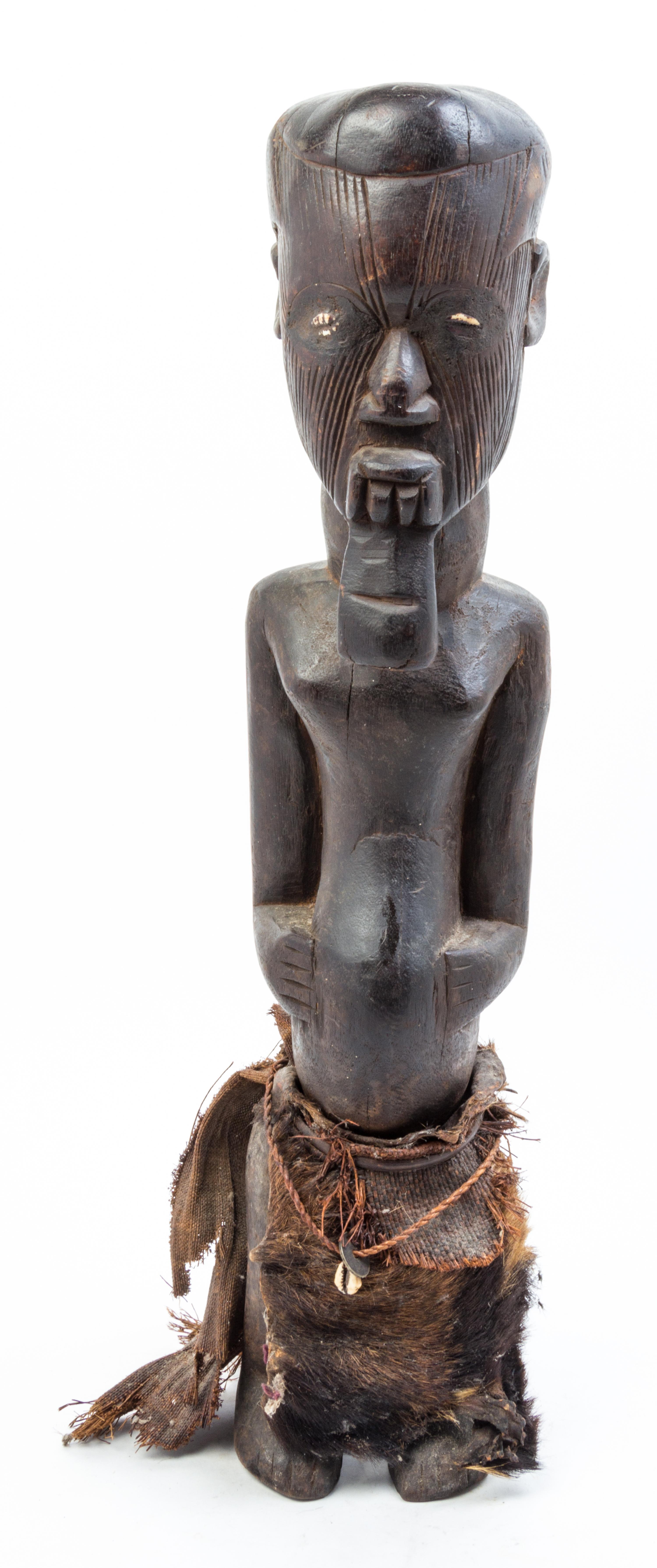 An African Wood Figure Height 25 1/4 inches.
