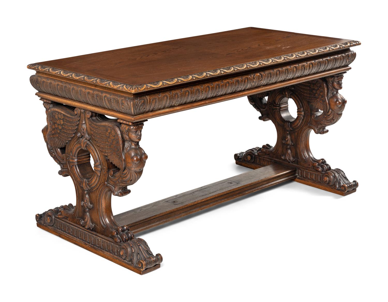 A Renaissance Revival Carved Walnut Table