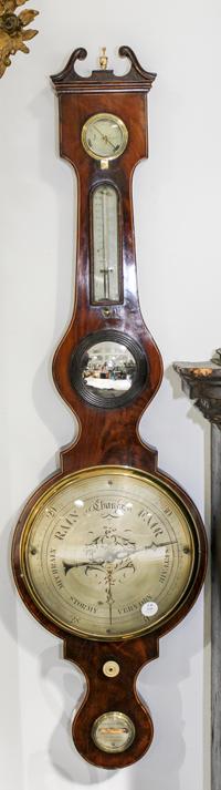 An English Mahogany Wheel Barometer Height 43 inches. — 19TH CENTURY