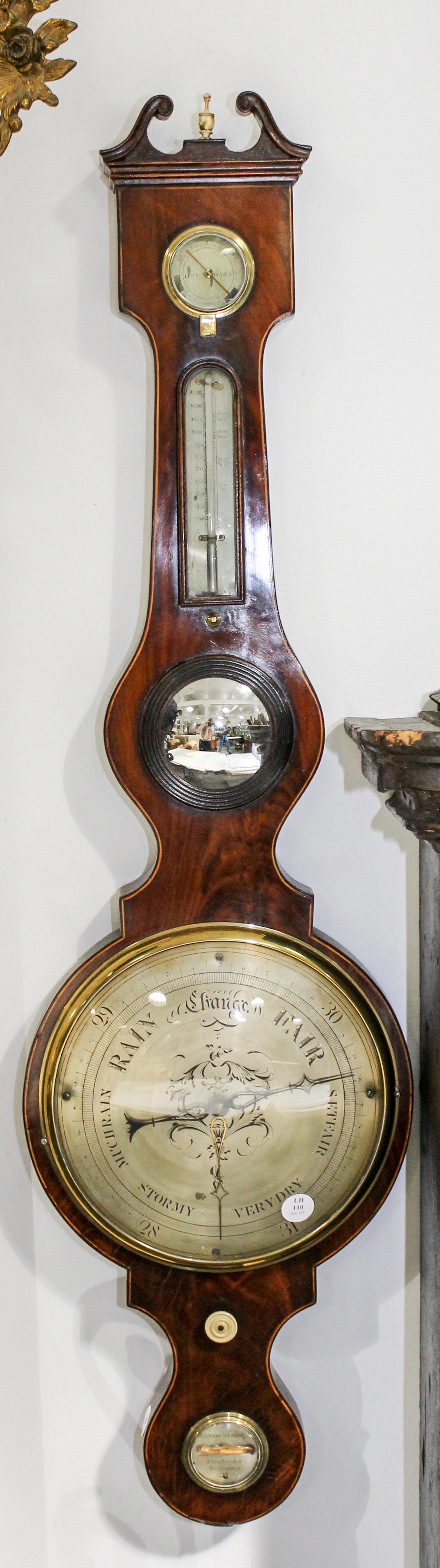 An English Mahogany Wheel Barometer Height 43 inches. — 19TH CENTURY