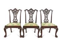 A Set of Eleven George III Style Ribbon-Carved Mahogany Dining Chairs