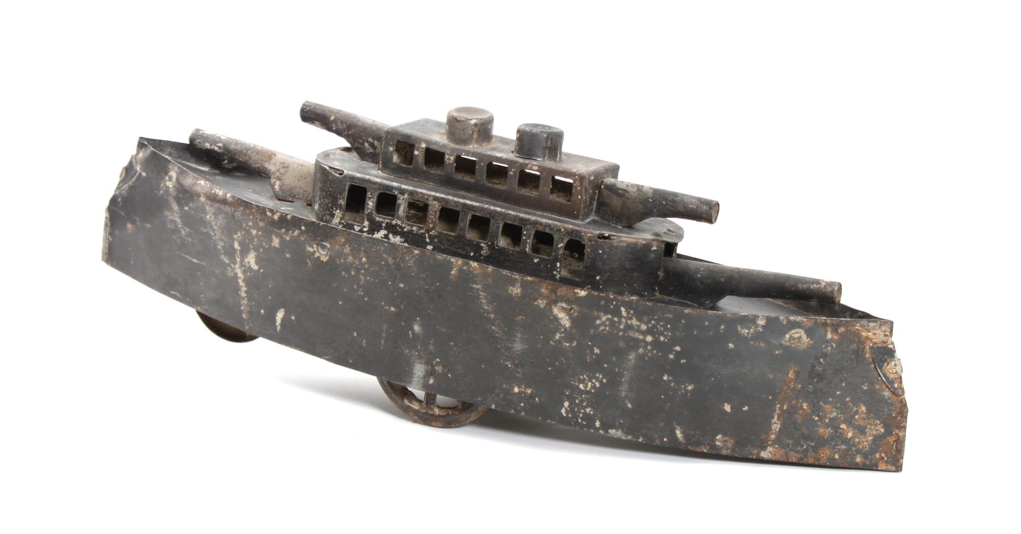 A Model Metal Frigate Height 5 x length 15 x width 3 1/4 inches
