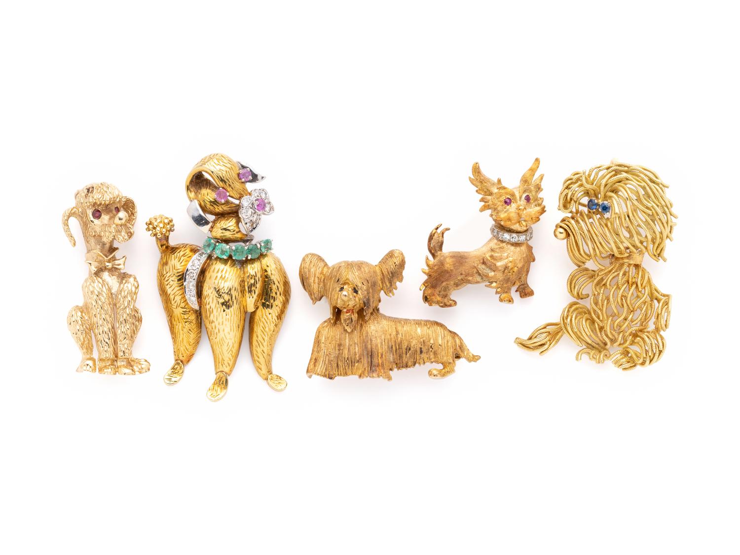 COLLECTION OF YELLOW GOLD DOG BROOCHES