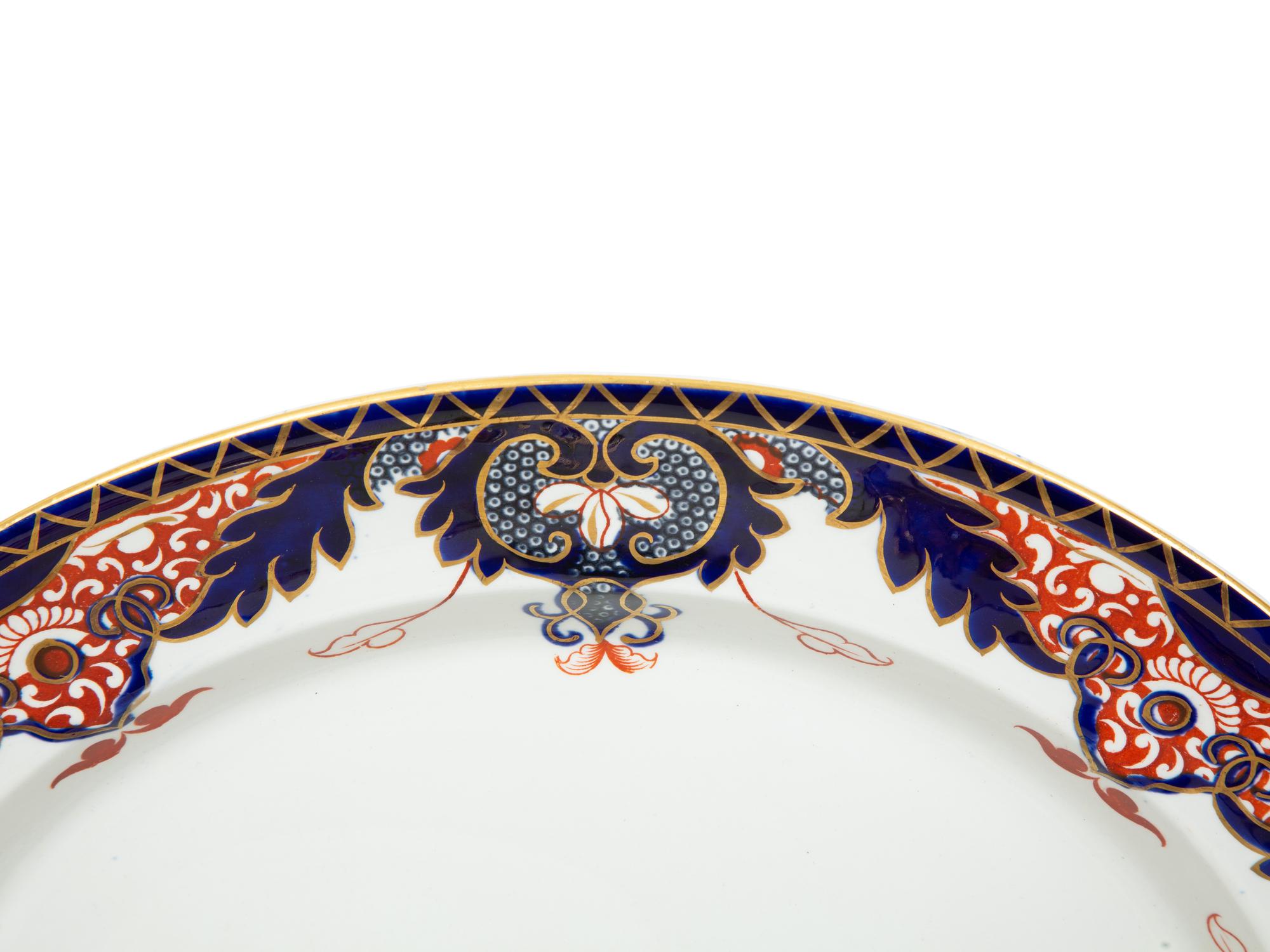 An Assembled Royal Crown Derby Porcelain Dinner Service