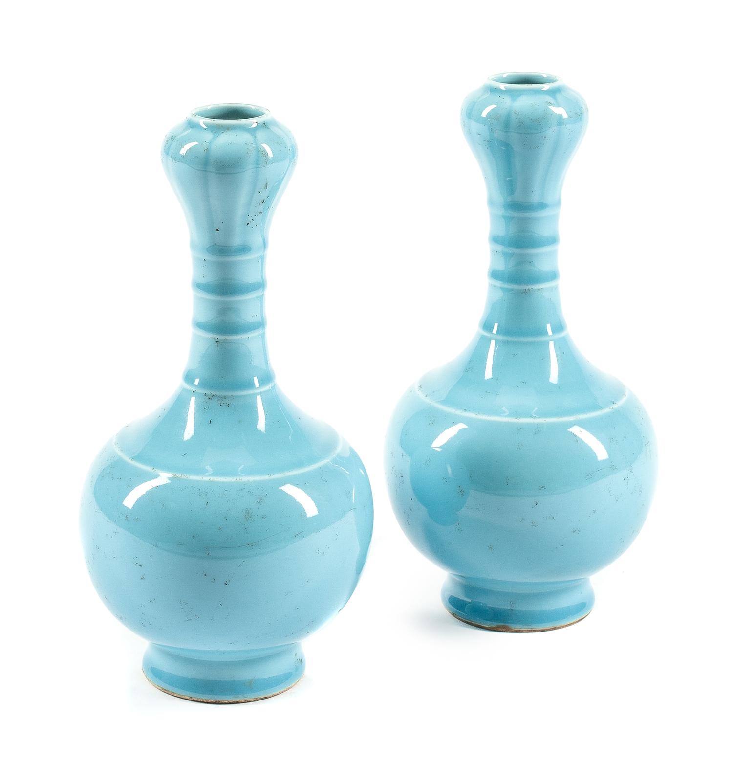 A Pair of Chinese Celeste Bleu Glazed Porcelain Vases Height 10 1/2 inches.