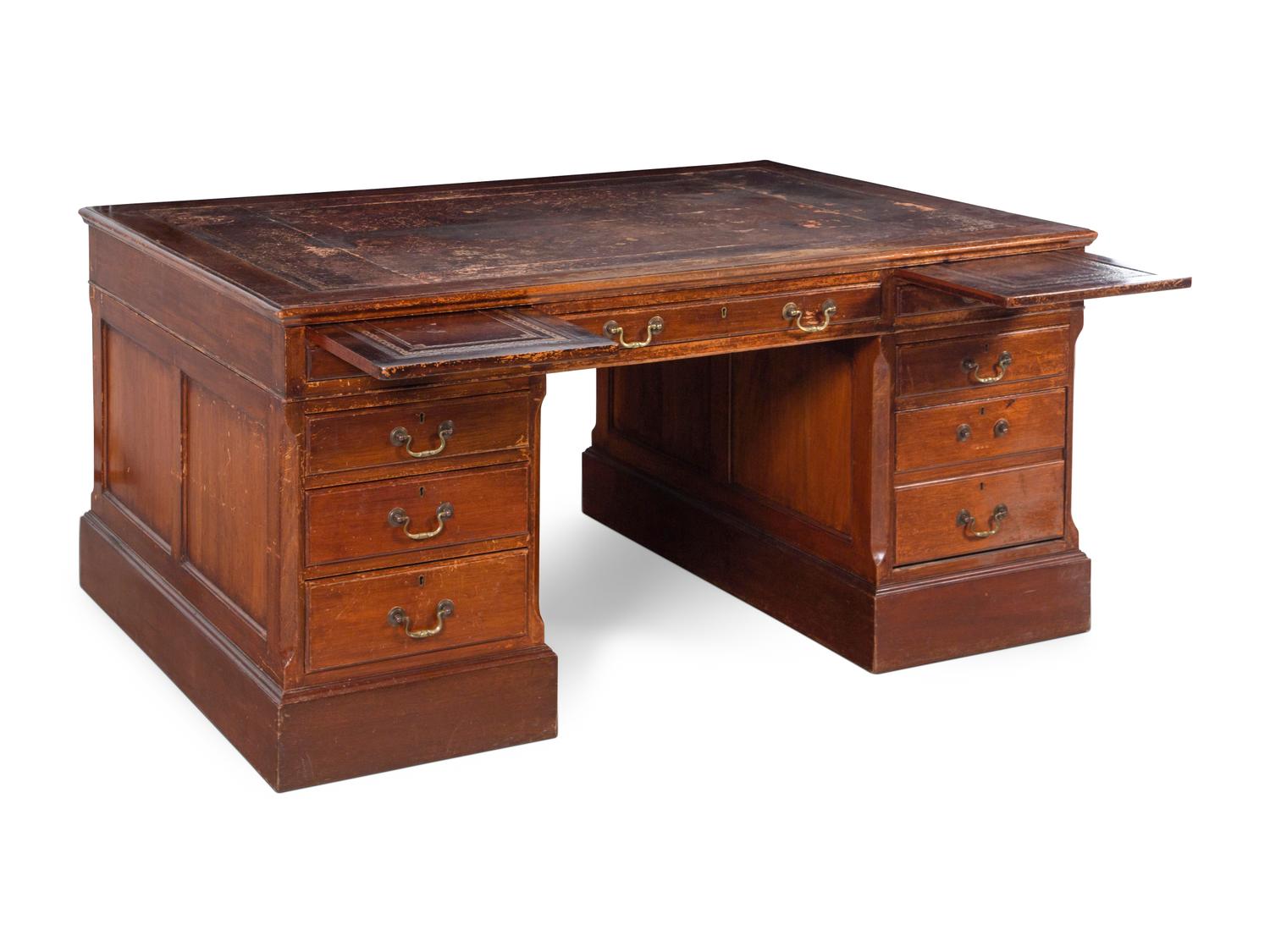 An Edwardian Tooled Leather-Inset Mahogany Partners' Desk