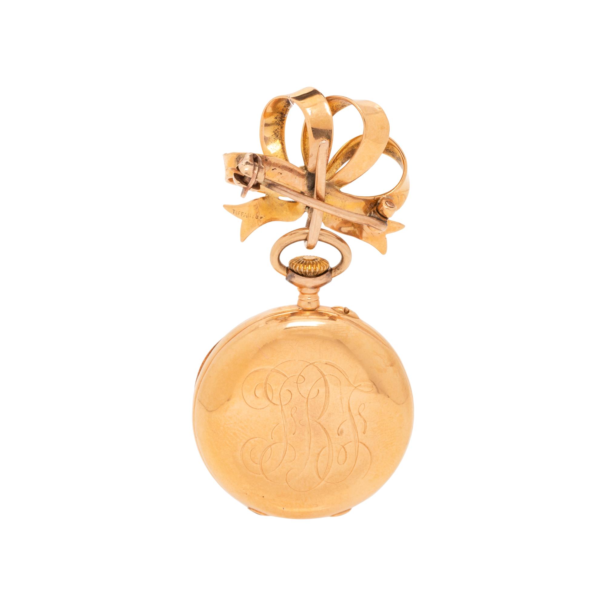 TIFFANY & CO., 18K YELLOW GOLD LAPEL WATCH