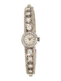 GÜBELIN, WHITE GOLD AND DIAMOND WATCH