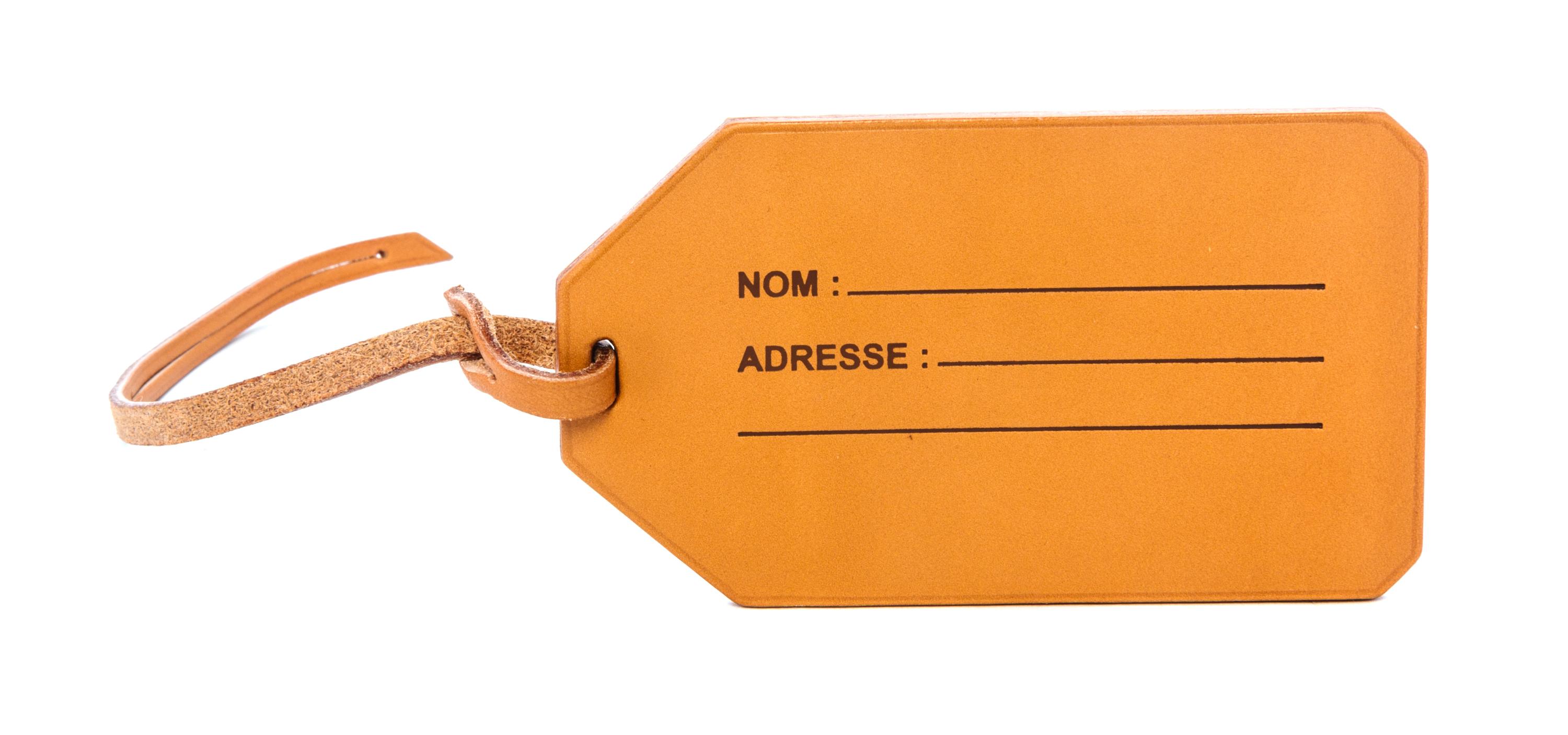 An Hermes Brown Leather Luggage Tag,