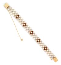 LUCIEN PICCARD, CULTURED PEARL AND GARNET BRACELET