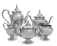 An American Silver Coffee and Tea Service, Gorham Mfg. Co., Providence, RI, in the Puritan pattern, comprising a coffee pot, a teapot,