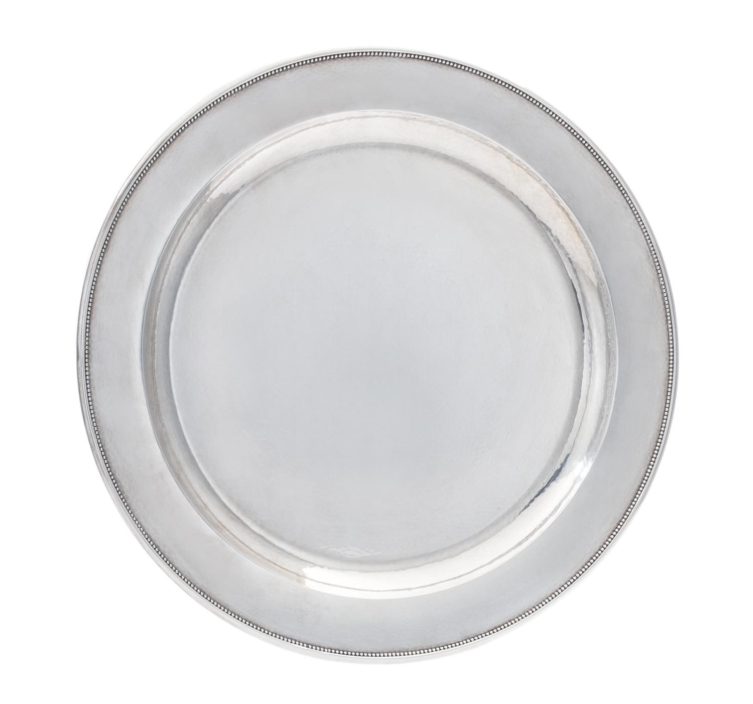 A Danish Silver Tray, Georg Jensen Silversmithy, Copenhagen, Second Half 20th Century, having a spot-hammered finish throughout with a